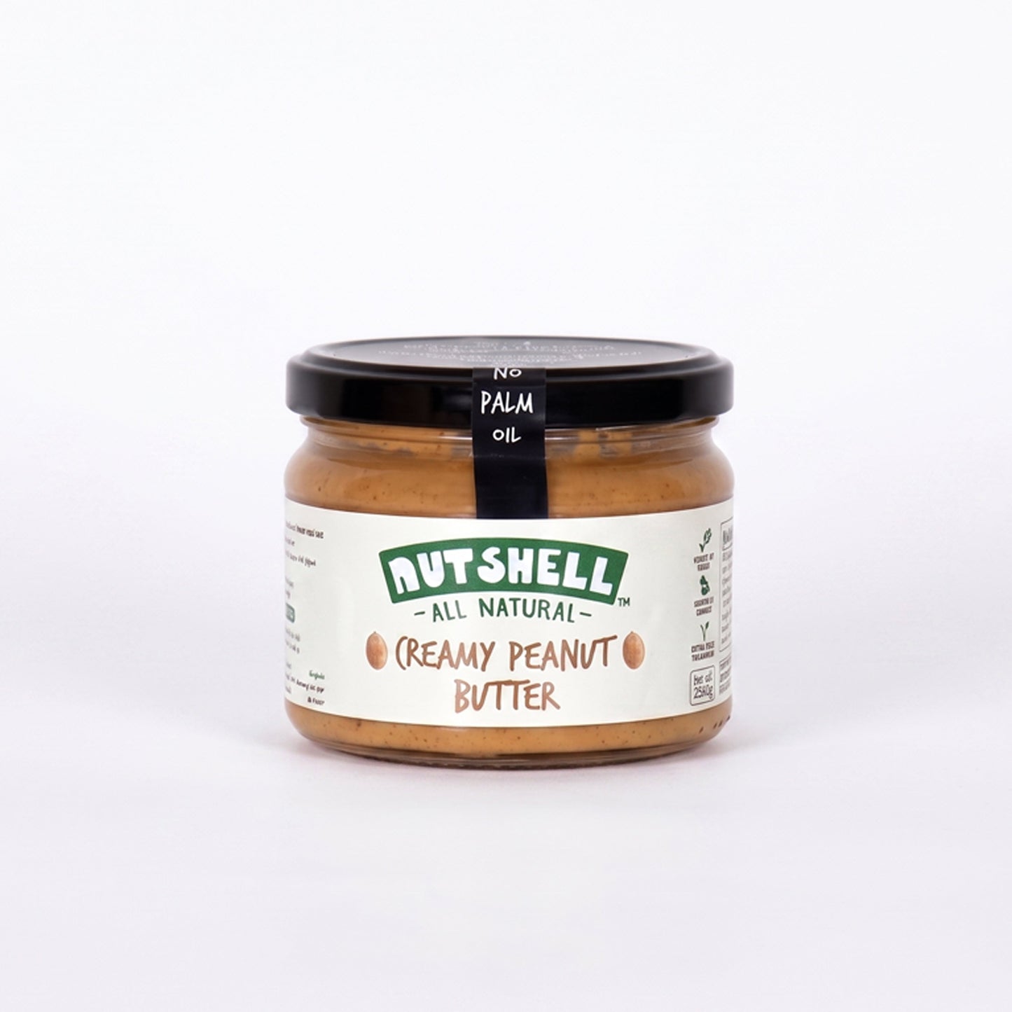 A jar of Nutshell All Natural Creamy Peanut Butter on a clean white background.