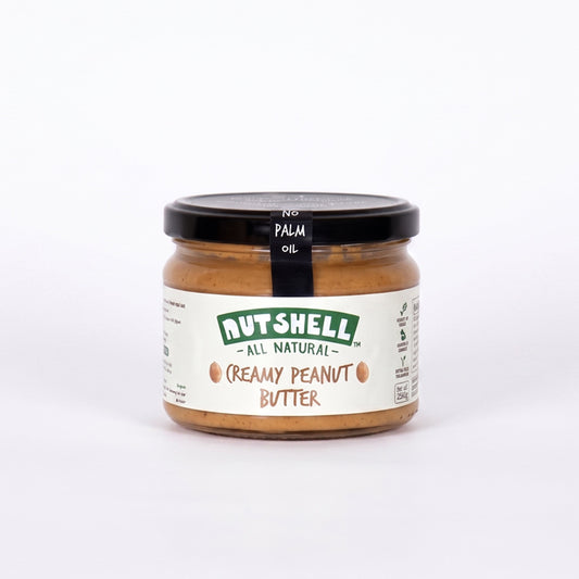 A jar of Nutshell All Natural Creamy Peanut Butter on a clean white background.