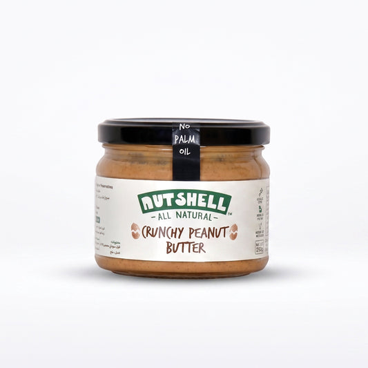 A jar of Nutshell All Natural Quinoa Peanut Butter on a clean white background.